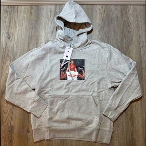 Jordan
Air Jordan x Undefeated Weights Hoodie 'Heather Grey' DX6317-050